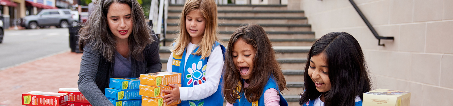  Girl Scout Daisy troop at a cookie booth 